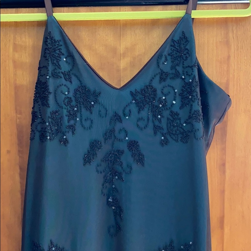 Gorgeous beaded dress.  Simple.  Elegant.